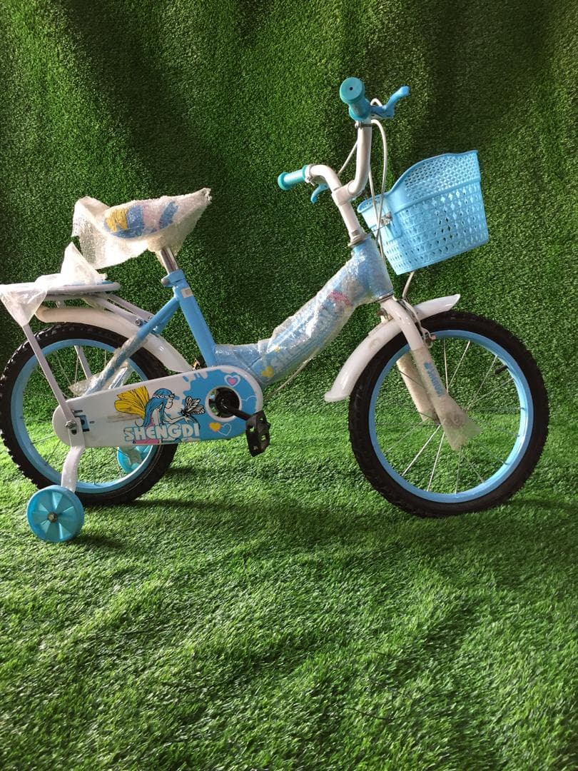 Children's bicycle with training wheels and front basket from our mother care range.