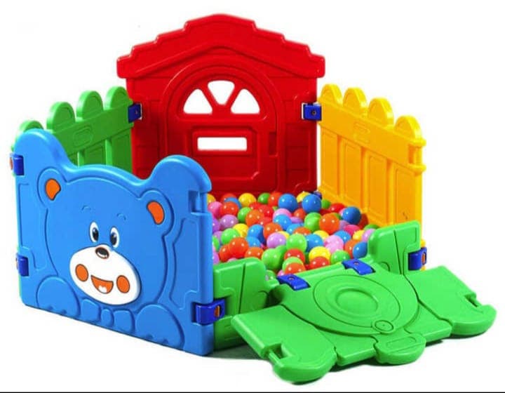 Bear themed play fence enclosing a ball pool for indoor play areas.